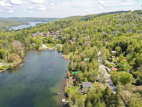 Aerial photo - 53 Ch. Du Lac-Morency, Saint-Hippolyte, QC - Outdoor With Body Of Water With View