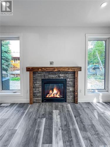 4 Harnish Place, Candle Lake, SK - Indoor Photo Showing Living Room With Fireplace