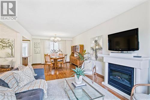 1833 St John'S Road, Innisfil, ON - Indoor Photo Showing Living Room With Fireplace