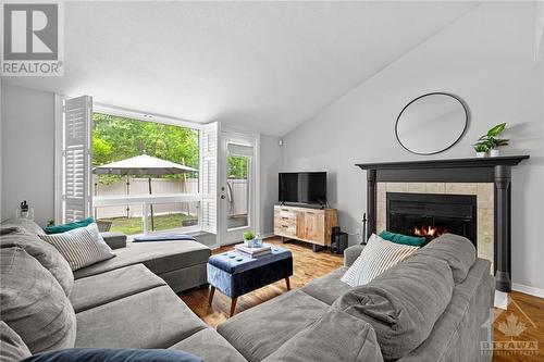 7 Gentle Gate Crescent, Ottawa, ON - Indoor Photo Showing Living Room With Fireplace