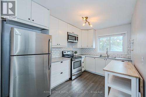 60 - 443 Victoria Road N, Guelph, ON - Indoor Photo Showing Kitchen With Stainless Steel Kitchen With Double Sink