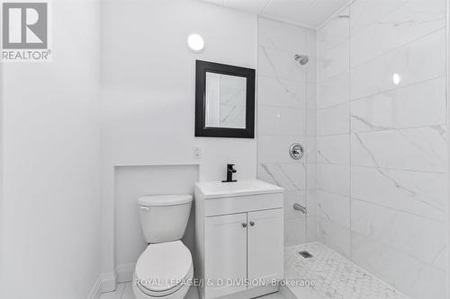 102 - 325 Sammon Avenue, Toronto, ON - Indoor Photo Showing Bathroom