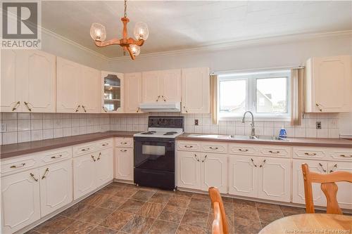 7705 Saint-Paul Street, Bas-Caraquet, NB - Indoor Photo Showing Kitchen With Double Sink