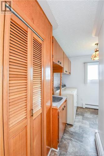 7705 Saint-Paul Street, Bas-Caraquet, NB - Indoor Photo Showing Laundry Room