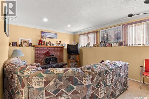 75 Groome Avenue, Regina, SK - Indoor With Fireplace