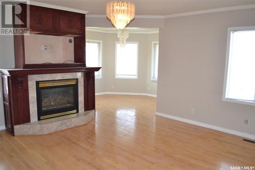 203 1St Street N, Flaxcombe, SK - Indoor Photo Showing Living Room With Fireplace