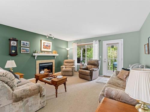 48-2675 Pine Avenue, Lumby, BC - Indoor Photo Showing Living Room With Fireplace