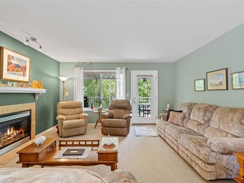 48-2675 Pine Avenue, Lumby, BC - Indoor Photo Showing Living Room With Fireplace