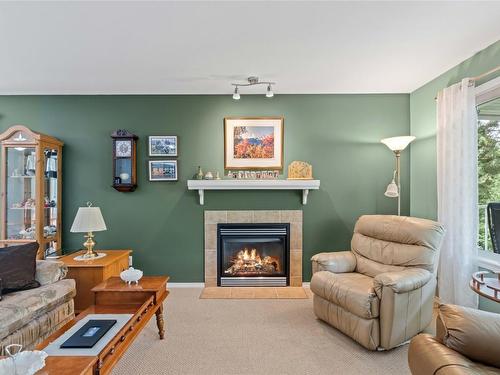 48-2675 Pine Avenue, Lumby, BC - Indoor Photo Showing Living Room With Fireplace