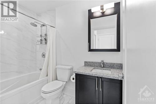 Upgraded main bathroom tile to marble - 805 Carling Avenue Unit#4003, Ottawa, ON - Indoor Photo Showing Bathroom