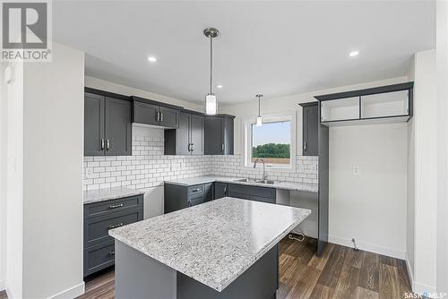 309 Reddekopp Crescent, Warman, SK - Indoor Photo Showing Kitchen With Upgraded Kitchen