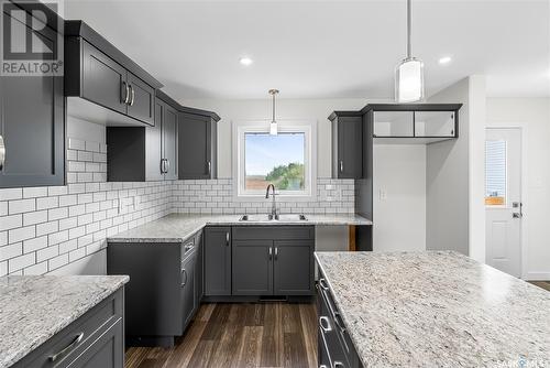 309 Reddekopp Crescent, Warman, SK - Indoor Photo Showing Kitchen With Double Sink