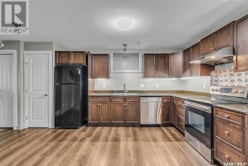 3322 Mcclocklin Road, Saskatoon, SK - Indoor Photo Showing Kitchen With Stainless Steel Kitchen