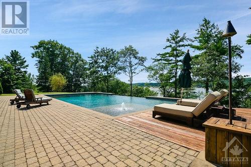 2892 Presquile Road, Lefaivre, ON - Outdoor With In Ground Pool