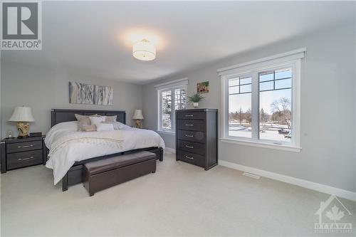 Primary Bedroom with Large Walk-In Closet and 4 Piece En-Suite - 340 Kilspindie Ridge, Ottawa, ON - Indoor Photo Showing Bedroom