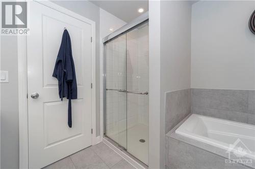 Primary Bedroom En-Suite Glass Shower - 340 Kilspindie Ridge, Ottawa, ON - Indoor Photo Showing Bathroom
