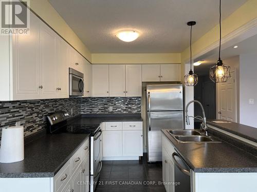 2025 Denview Avenue, London, ON - Indoor Photo Showing Kitchen With Stainless Steel Kitchen With Double Sink With Upgraded Kitchen