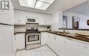 1605 - 325 Webb Drive, Mississauga, ON  - Indoor Photo Showing Kitchen With Double Sink 