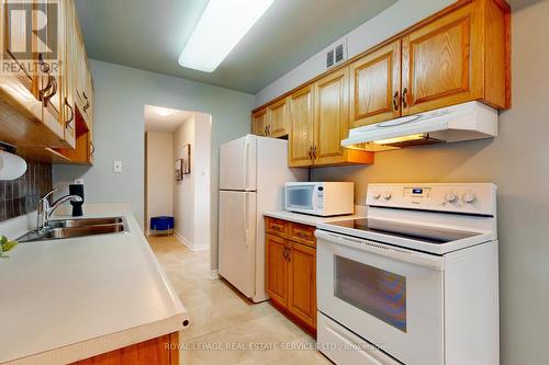 2111 - 61 Richview Road, Toronto, ON - Indoor Photo Showing Kitchen With Double Sink