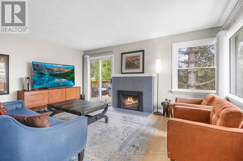 211 Trowbridge Avenue, London, ON - Indoor Photo Showing Living Room With Fireplace
