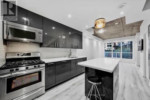 106 - 1 Shaw Street, Toronto, ON - Indoor Photo Showing Kitchen With Upgraded Kitchen