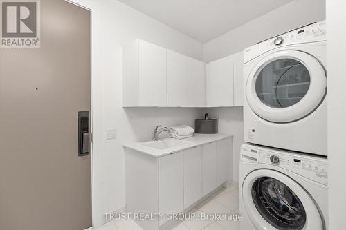 6307 - 10 York Street, Toronto, ON - Indoor Photo Showing Laundry Room