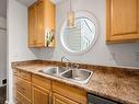 215-205 1St St, Courtenay, BC  - Indoor Photo Showing Kitchen With Double Sink 