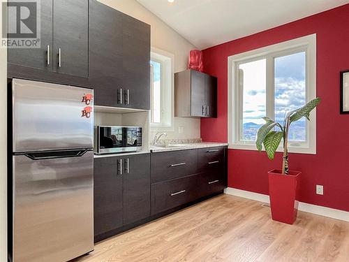 1551 3 Highway E, Osoyoos, BC - Indoor Photo Showing Kitchen