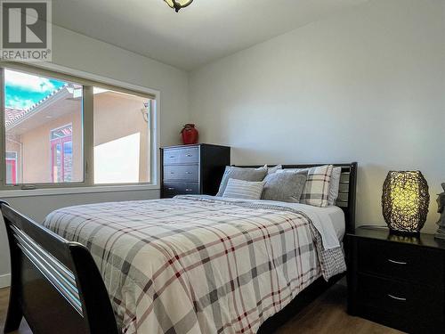 1551 3 Highway E, Osoyoos, BC - Indoor Photo Showing Bedroom