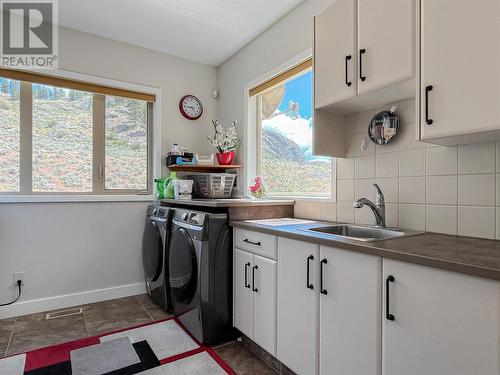 1551 3 Highway E, Osoyoos, BC - Indoor Photo Showing Laundry Room