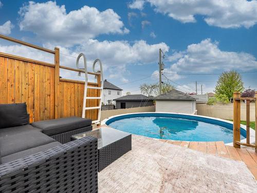 Piscine - 338 Rue Péladeau, Châteauguay, QC - Outdoor With Above Ground Pool