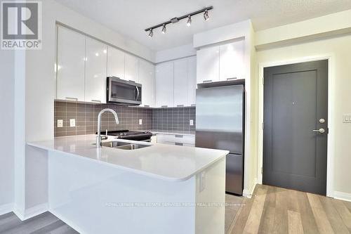 415 - 5033 Four Springs Avenue, Mississauga, ON - Indoor Photo Showing Kitchen With Double Sink With Upgraded Kitchen