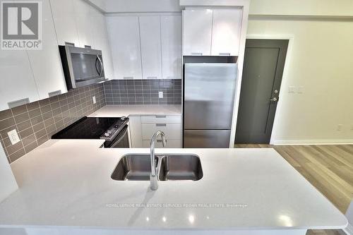 415 - 5033 Four Springs Avenue, Mississauga, ON - Indoor Photo Showing Kitchen With Double Sink