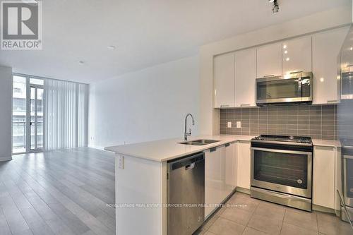 415 - 5033 Four Springs Avenue, Mississauga, ON - Indoor Photo Showing Kitchen With Double Sink With Upgraded Kitchen