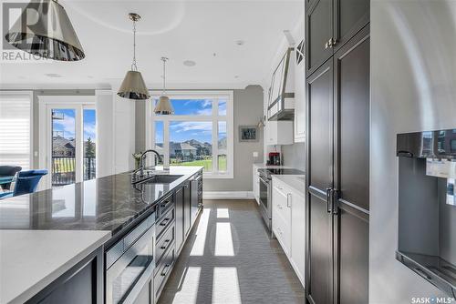 111 404 Cartwright Street, Saskatoon, SK - Indoor Photo Showing Kitchen With Stainless Steel Kitchen With Upgraded Kitchen