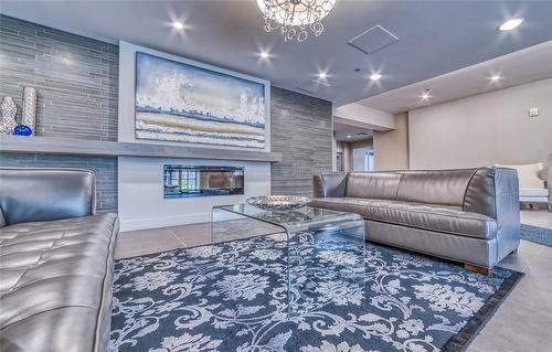 90 Charlton Avenue W|Unit #202, Hamilton, ON - Indoor Photo Showing Living Room With Fireplace