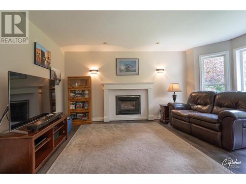 450 River  W Drive, Christina Lake, BC - Indoor Photo Showing Living Room With Fireplace