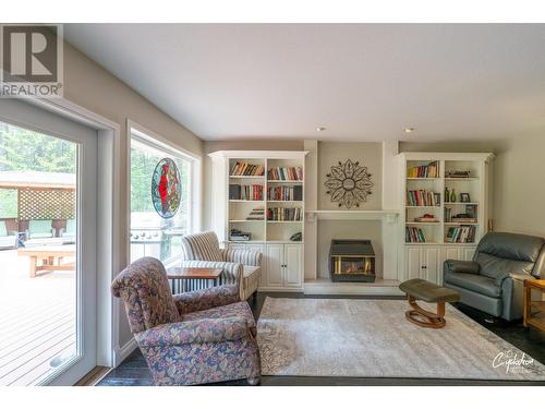 450 River  W Drive, Christina Lake, BC - Indoor Photo Showing Living Room With Fireplace