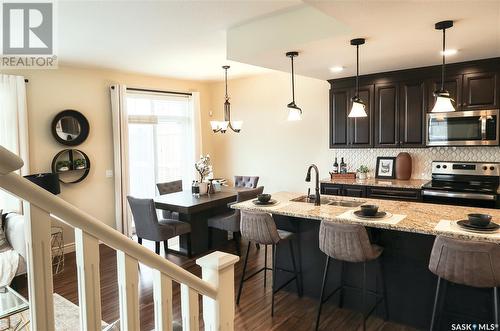 258 Schmeiser Bend, Saskatoon, SK - Indoor Photo Showing Kitchen With Upgraded Kitchen