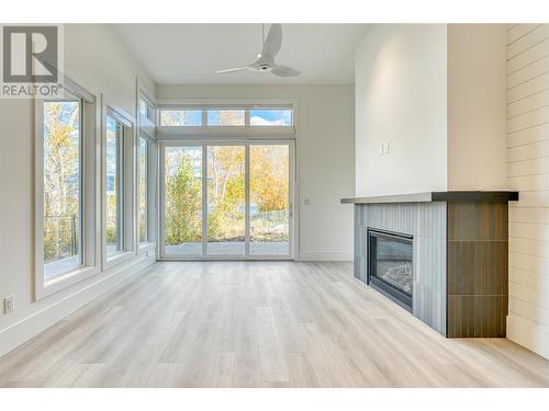 3350 Landry Crescent, Summerland, BC - Indoor Photo Showing Other Room With Fireplace