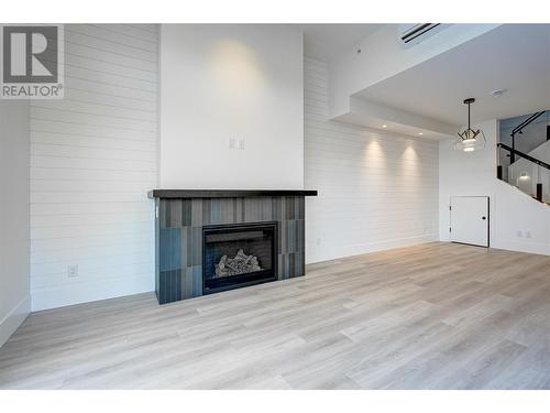 3350 Landry Crescent, Summerland, BC - Indoor Photo Showing Living Room With Fireplace