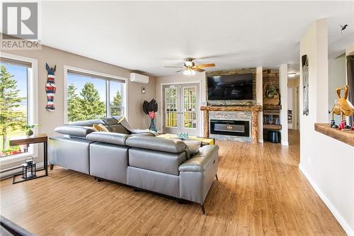 141 Marys Point Road, Harvey, NB - Indoor Photo Showing Living Room With Fireplace