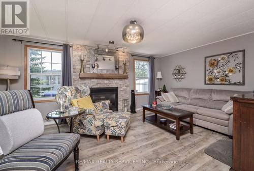 3 St James Place, Wasaga Beach, ON - Indoor Photo Showing Living Room With Fireplace