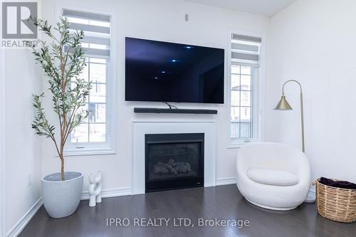 3 Novice Drive, Brampton, ON - Indoor Photo Showing Living Room With Fireplace