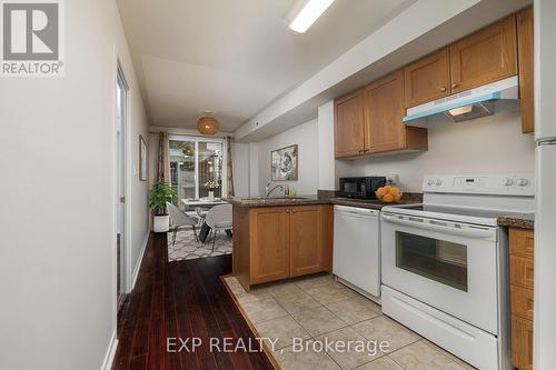 105 - 35 Strangford Lane, Toronto, ON - Indoor Photo Showing Kitchen