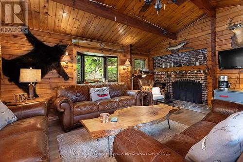 1003 Avon Lane, Muskoka Lakes, ON - Indoor Photo Showing Living Room With Fireplace