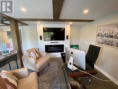 807 Mosley Street, Wasaga Beach, ON - Indoor Photo Showing Other Room With Fireplace