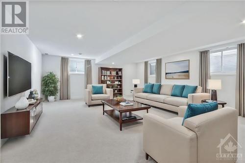 Virtually Staged RecRoom - 100 Warrior Street, Ottawa, ON - Indoor Photo Showing Living Room