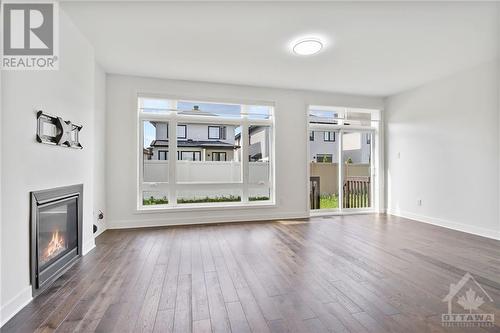 100 Warrior Street, Ottawa, ON - Indoor Photo Showing Living Room With Fireplace