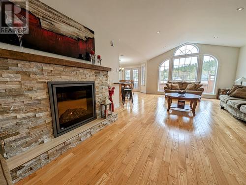 18 Burtons Road, Corner Brook, NL - Indoor Photo Showing Living Room With Fireplace